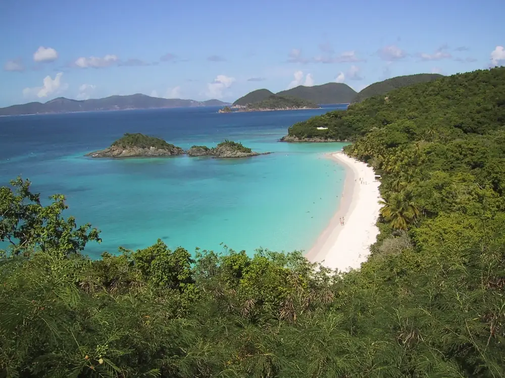St. John coastline, green hills and Cruz Bay harbor